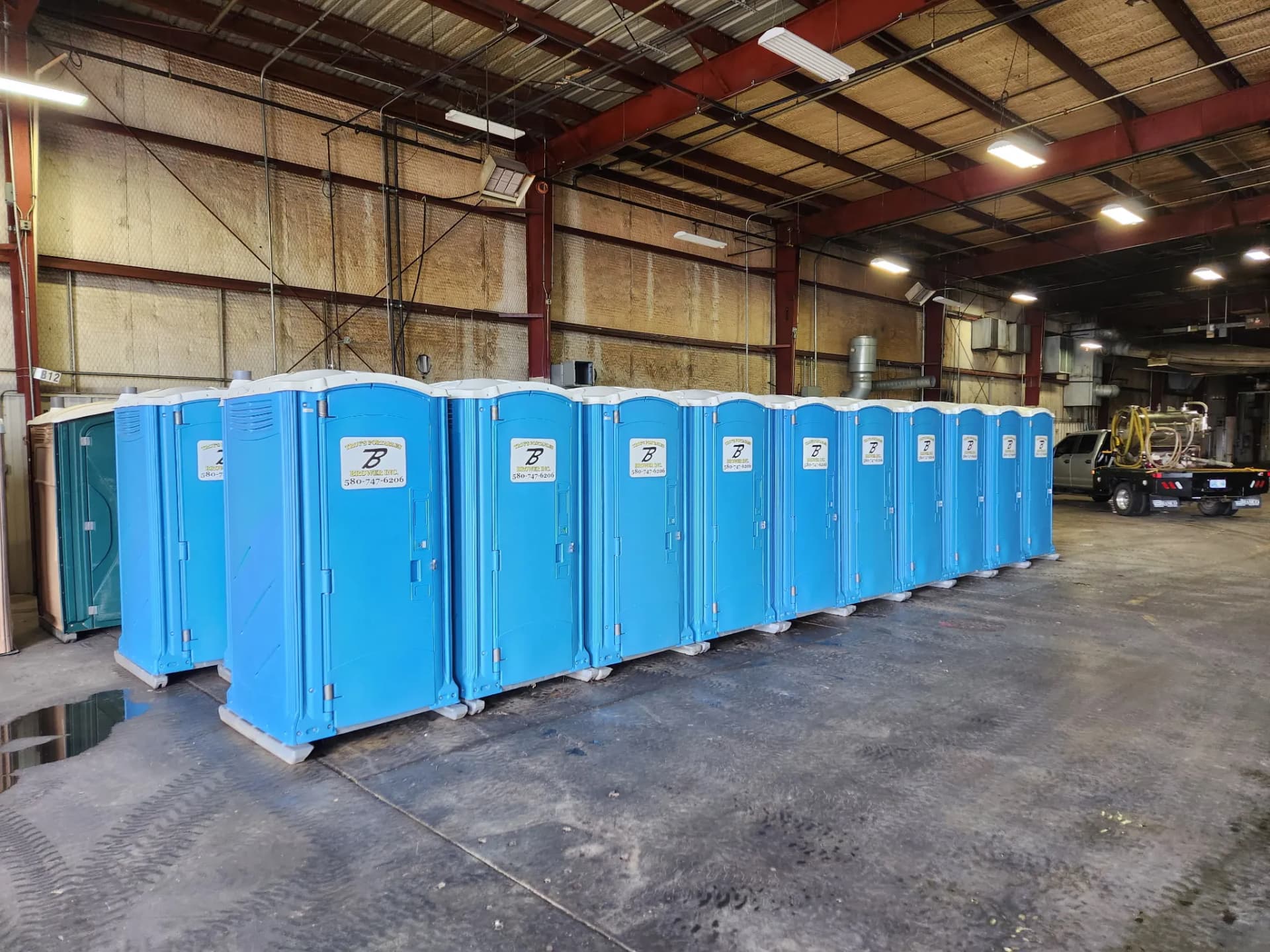 Brower Inc. portable restroom fleet inventory at the Newkirk, Oklahoma warehouse ready for oil field deployment