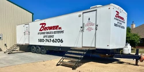 Brower Inc. septic service truck at a residential property in Oklahoma