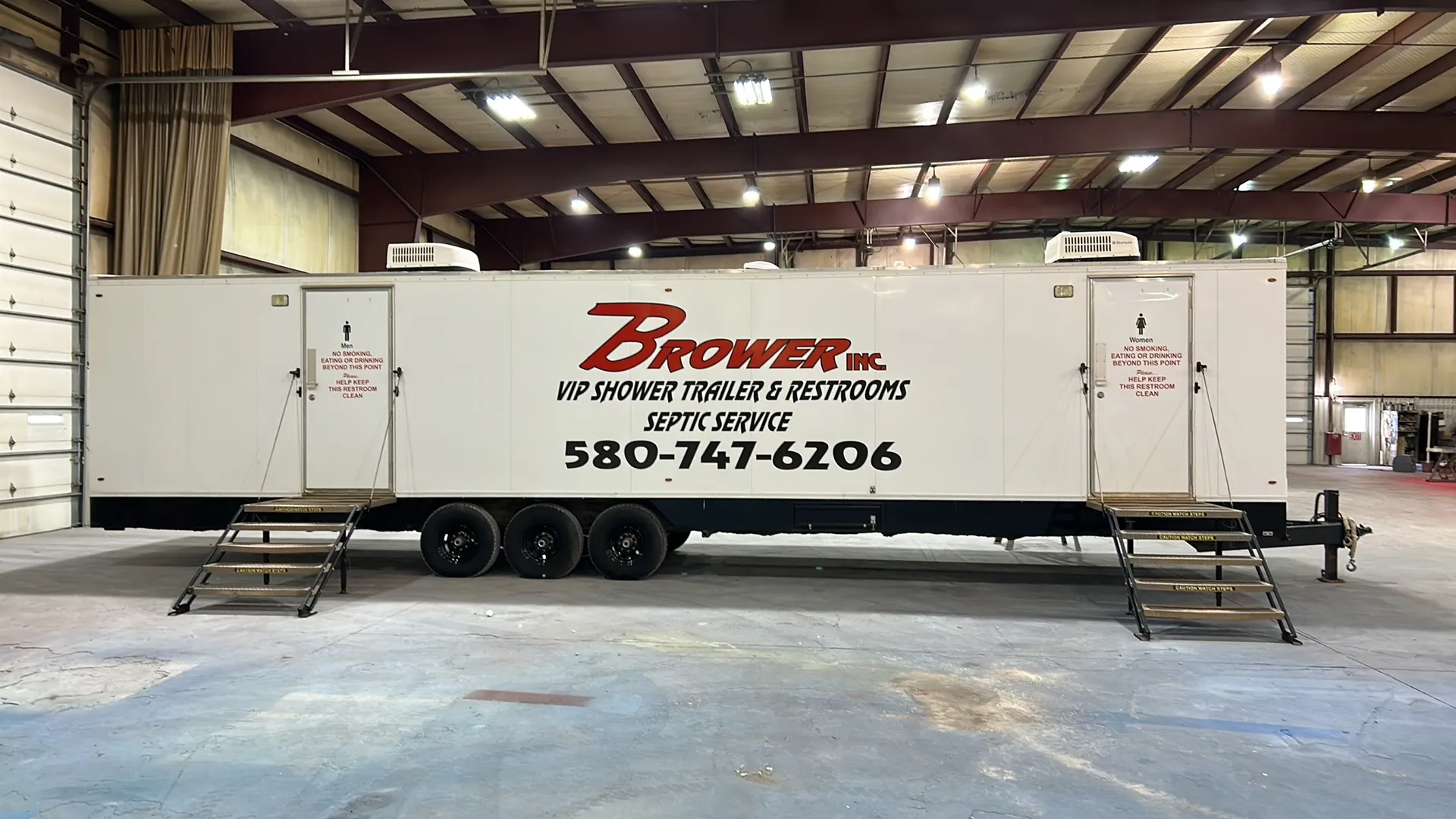 Brower Inc. VIP shower and restroom combo trailer in warehouse, Newkirk, Oklahoma