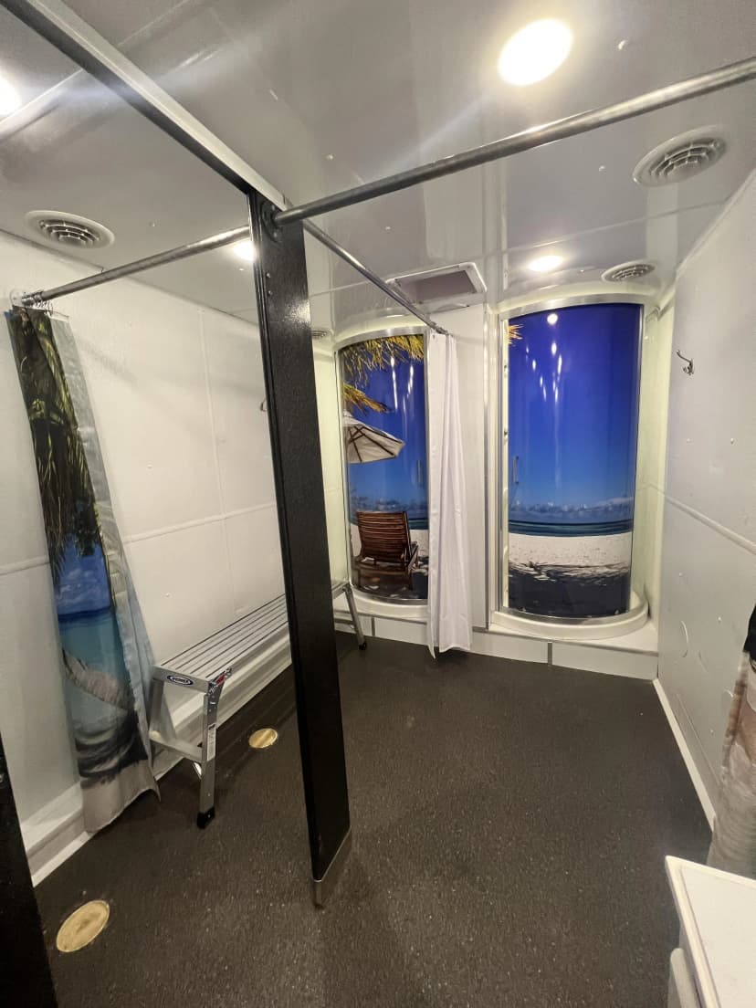 VIP shower trailer interior with shower stalls